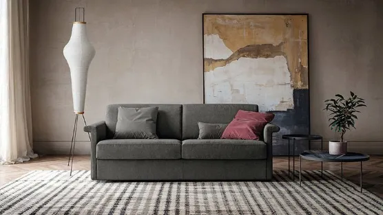 grey sofa bed with shaped armrest