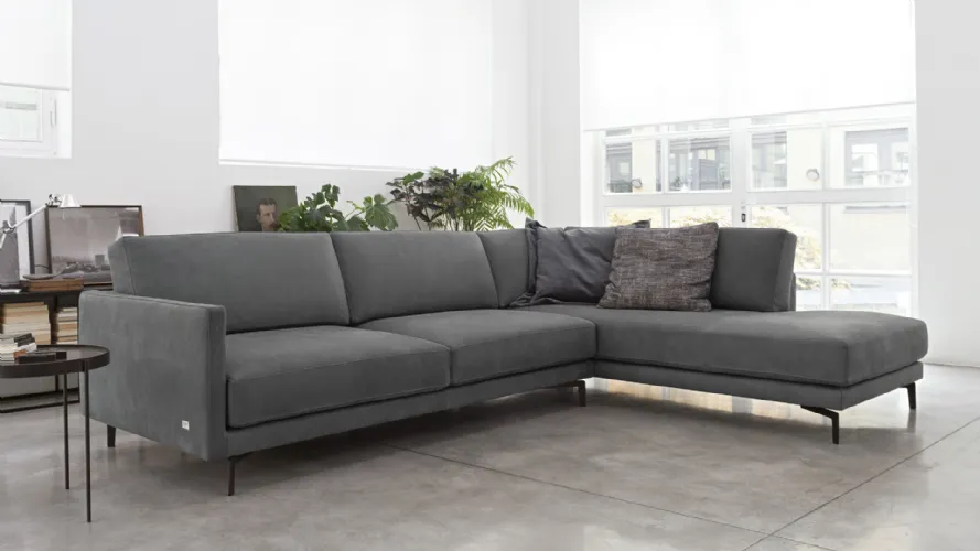 Dark leather sofa with Bart corner terminal.